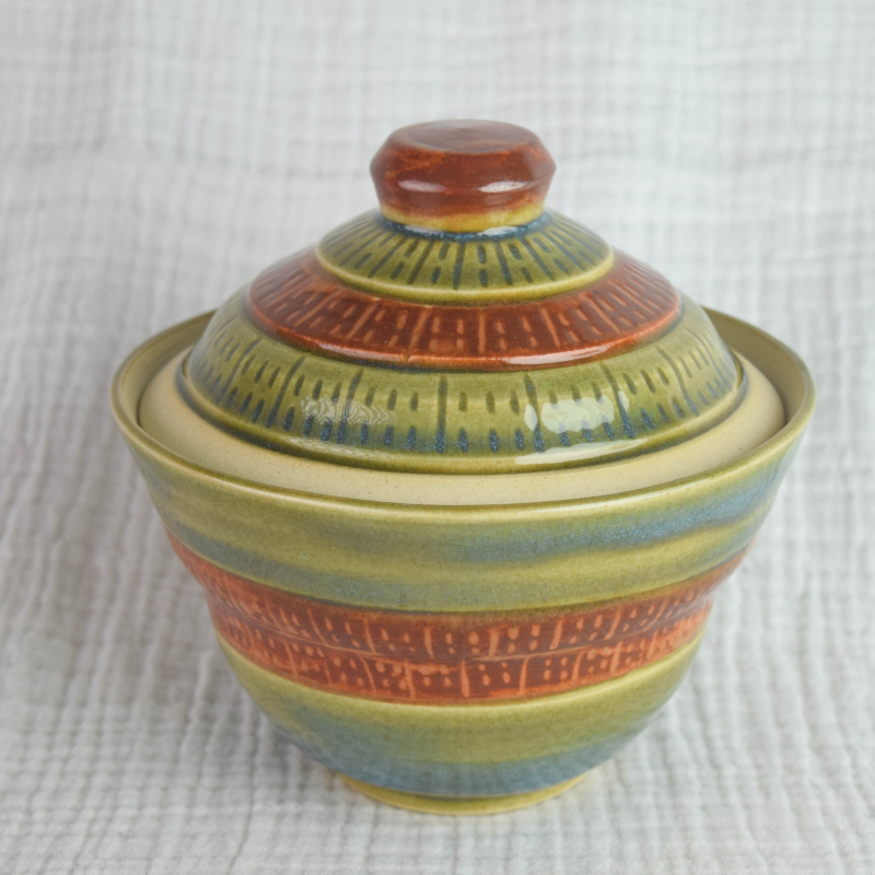 STRATA OF THE VERDANT COAST HOT - POT